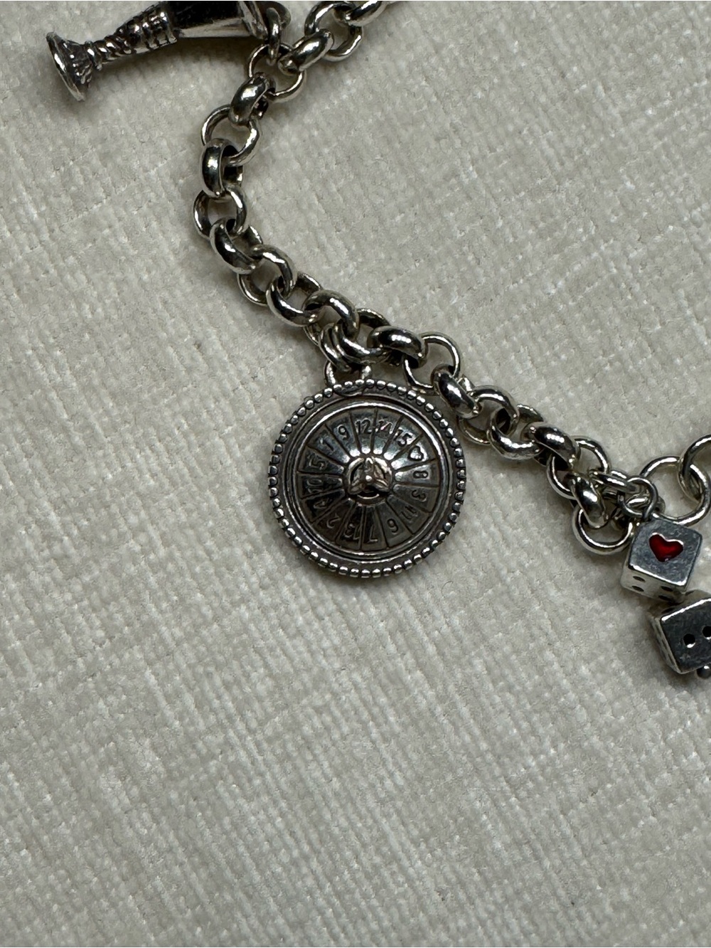 Brighton Silver-Tone Wheel & Dice Charm Bracelet with Red Accent Las Vegas